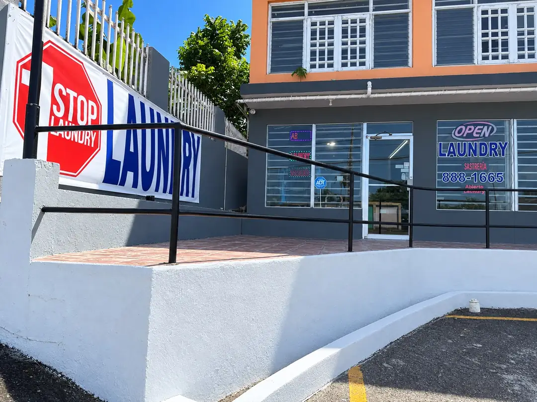 1 Stop Laundry storefront with its sign and entrance ramp, at Route 3, km 26.5, Río Grande, Puerto Rico